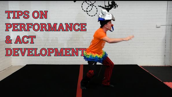 A clown on a unicycle with a red nose providing tips on performance and act development. Learn from the pros with our circus skills education pack and YouTube channel