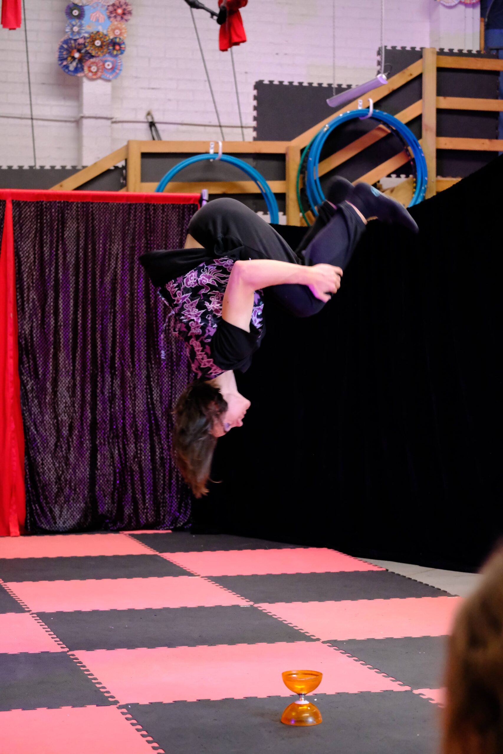 Tumbling is a classic circus skill and at Roundabout Circus we love seeing our students improve. Here we have one of our teens performing a somersault on our mats.