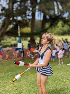 Juggler performs outside at event for kids and adults. Active Fest Central Coast will have performers and circus people flooding to the Coast to participate.