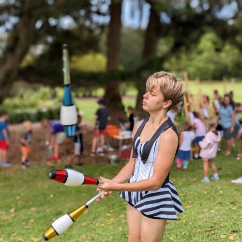 Juggler performs outside at event for kids and adults. Active Fest Central Coast will have performers and circus people flooding to the Coast to participate.